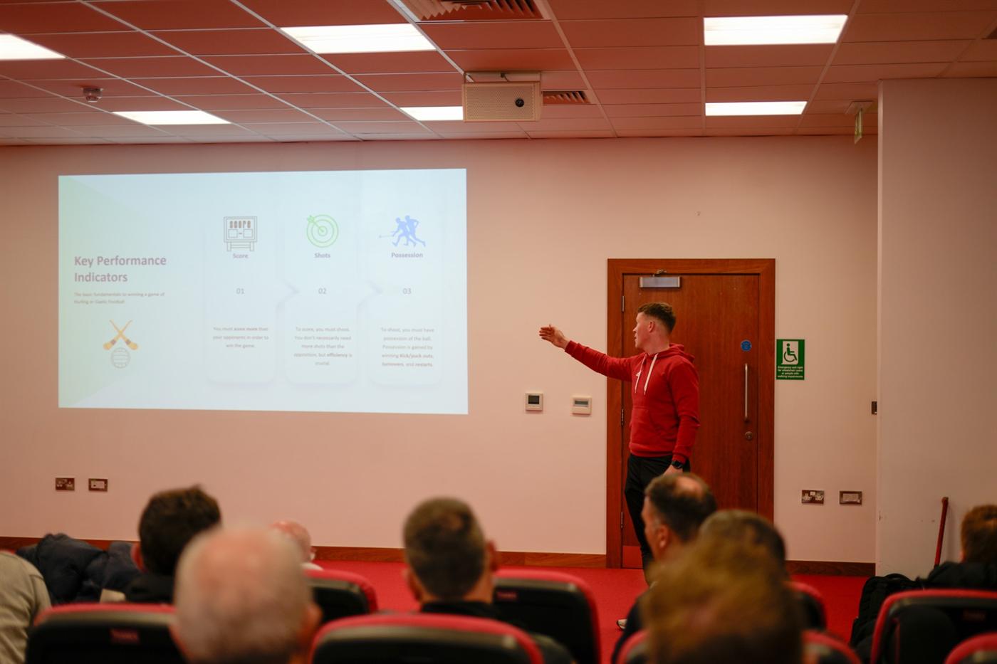 Shane presenting to coaches in a lecture room
