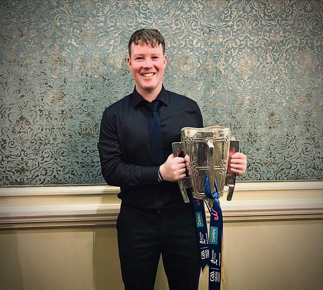 Shane Hassett holding the Liam MacCarthy Cup